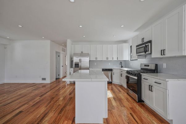 Interior, Kitchen, Recessed Lighting, Stainless Steel Appliances, Wood Texture Flooring