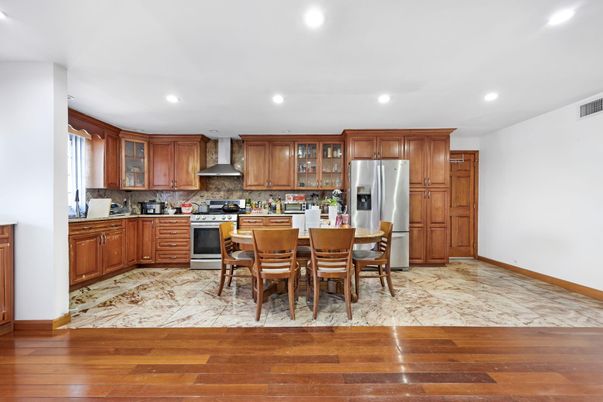 Dining room, Interior, Kitchen, Recessed Lighting, Stainless Steel Appliances, Wood Texture Flooring