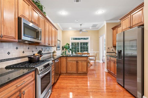 Dining room, Interior, Kitchen, Recessed Lighting, Stainless Steel Appliances, Wood Texture Flooring