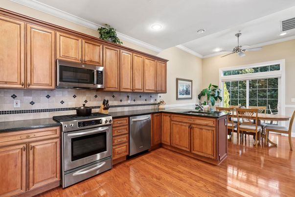 Dining room, Interior, Kitchen, Recessed Lighting, Stainless Steel Appliances, Wood Texture Flooring
