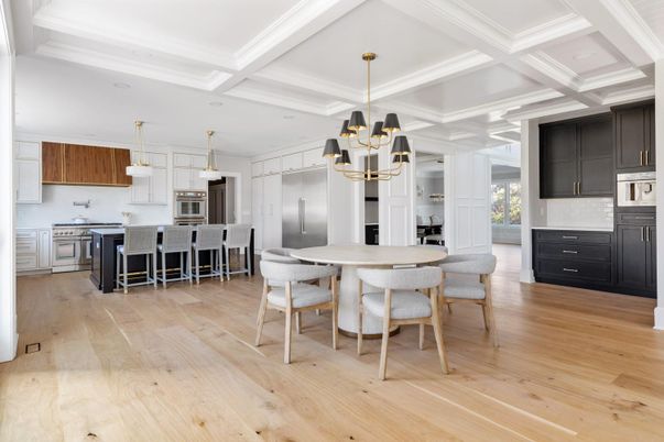Chandelier, Dining room, Interior, Kitchen, Pendant Lights, Recessed Lighting, Stainless Steel Appliances, Wood Texture Flooring