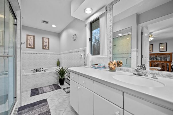 Bathroom, Dual Sink Vanities, Glass Shower, Interior, Marble, Recessed Lighting