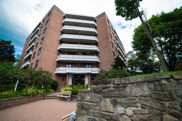 Exterior, Facade, Brick Facade, Condo Building
