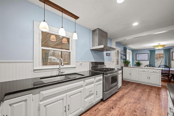 Interior, Kitchen, Pendant Lights, Recessed Lighting, Stainless Steel Appliances, Wood Texture Flooring