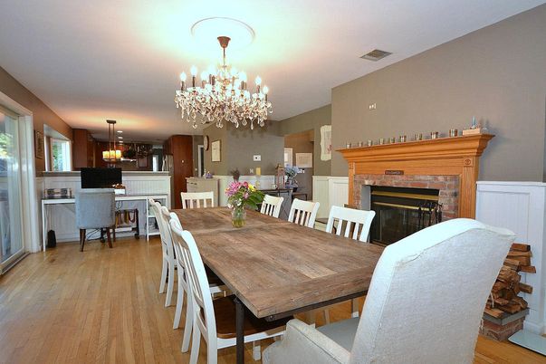 Chandelier, Dining room, Fireplace, Interior, Kitchen, Pendant Lights, Wood Texture Flooring