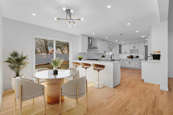 Dining room, Interior, Kitchen, Pendant Lights, Recessed Lighting, Stainless Steel Appliances, Wood Texture Flooring