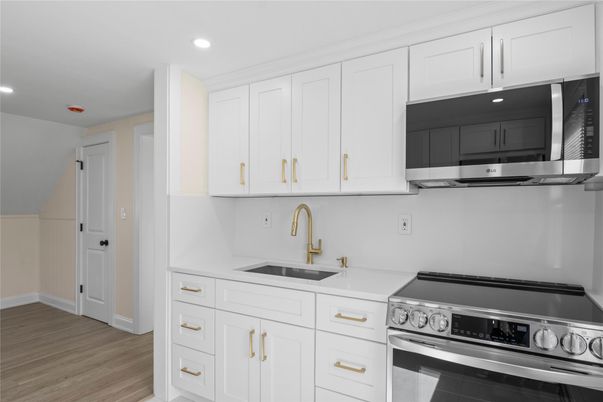 Interior, Kitchen, Recessed Lighting, Stainless Steel Appliances, Wood Texture Flooring