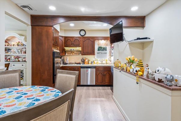 Dining room, Interior, Kitchen, Recessed Lighting, Stainless Steel Appliances, Wood Texture Flooring