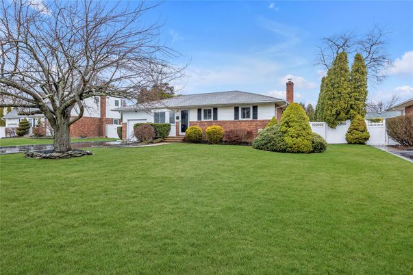 Attached, Backyard, Exterior, Facade, Brick Facade, Ranch