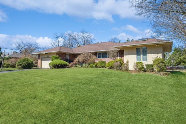 Attached, Backyard, Exterior, Facade, Brick Facade, Ranch