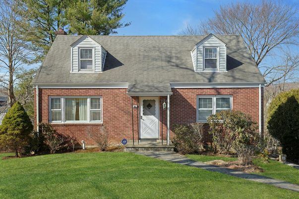 Exterior, Facade, Brick Facade, Cape Cod