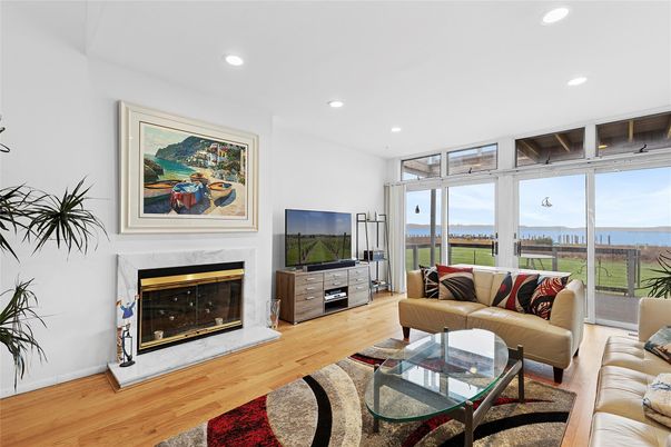 Fireplace, Interior, Living room, Recessed Lighting, Water, Wood Texture Flooring