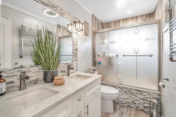 Bathroom, Dual Sink Vanities, Glass Shower, Interior, Recessed Lighting, Wood Texture Flooring
