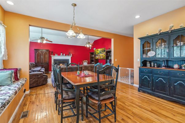 Dining room, Fireplace, Interior, Pendant Lights, Recessed Lighting, Wood Texture Flooring