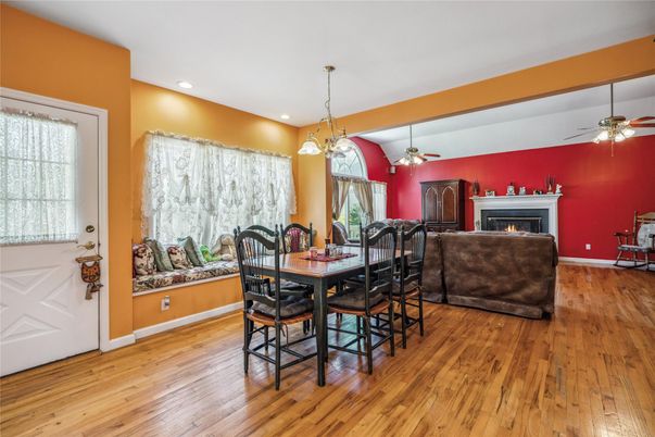 Dining room, Fireplace, Interior, Pendant Lights, Recessed Lighting, Wood Texture Flooring