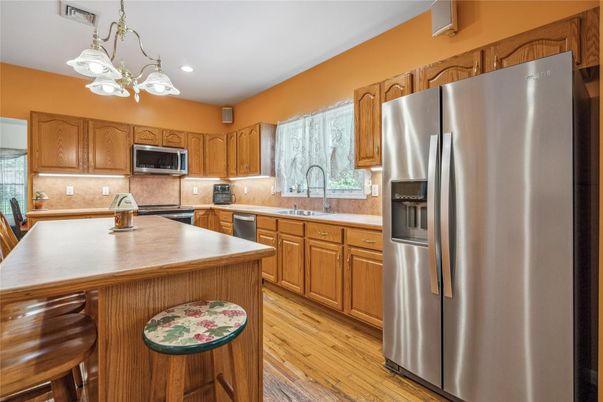 Interior, Kitchen, Recessed Lighting, Stainless Steel Appliances, Wood Texture Flooring