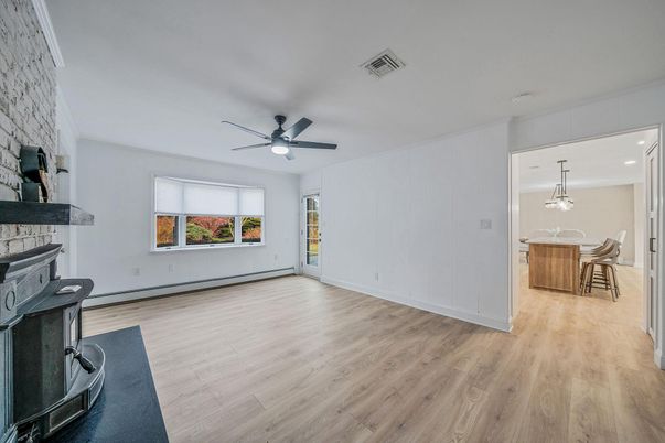 Chandelier, Dining room, Fireplace, Interior, Pendant Lights, Recessed Lighting, Wood Texture Flooring