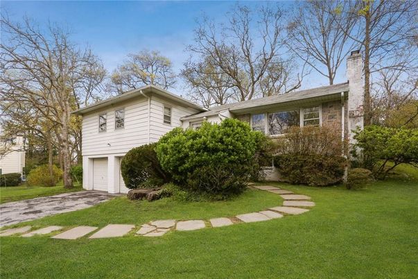 Attached, Backyard, Exterior, Facade, Brick Facade, Split Level
