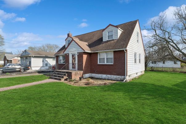 Attached, Exterior, Facade, Brick Facade, Cape Cod