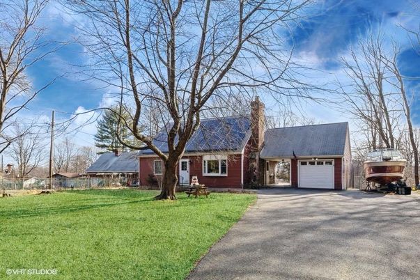 Attached, Backyard, Exterior, Facade, Brick Facade, Cape Cod