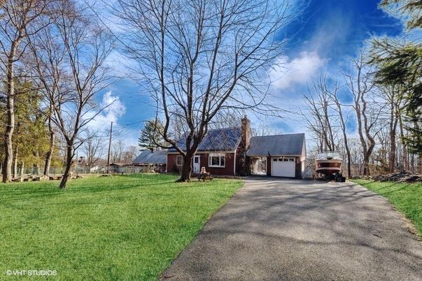 Attached, Backyard, Exterior, Facade, Brick Facade, Cape Cod