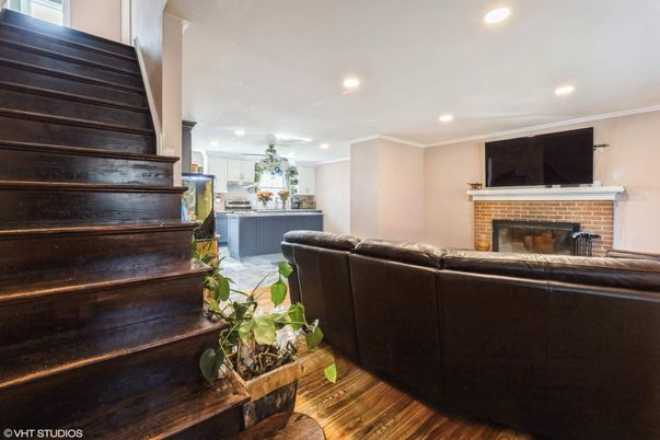 Fireplace, Interior, Living room, Recessed Lighting, Wood Texture Flooring