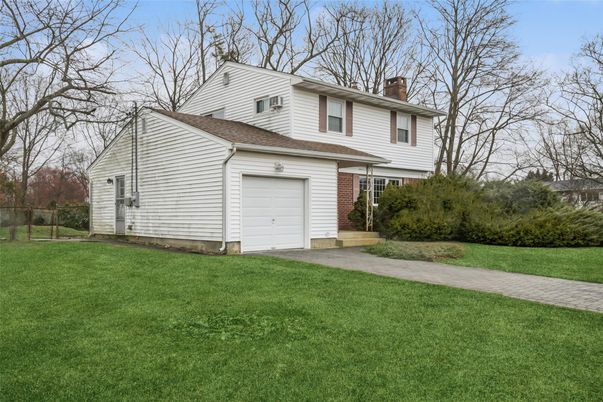 Attached, Backyard, Exterior, Facade, Brick Facade, Split Level