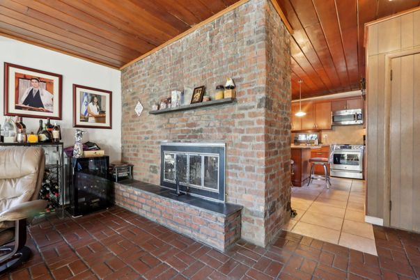 Fireplace, Interior, Kitchen, Stainless Steel Appliances, Stone Walls, Wooden Ceilings