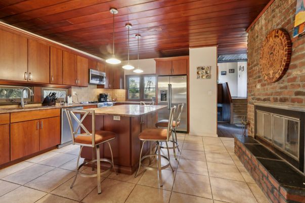 Interior, Kitchen, Pendant Lights, Stainless Steel Appliances, Stone Walls, Wooden Ceilings