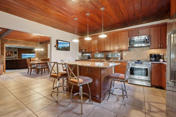 Dining room, Interior, Kitchen, Pendant Lights, Stainless Steel Appliances, Stone Walls, Wooden Ceilings