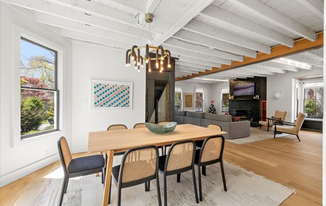 Dining room, Fireplace, Interior, Living room, Pendant Lights, Stone Walls, Wooden Beams, Wood Texture Flooring