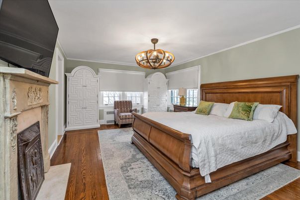 Bedroom, Chandelier, Fireplace, Interior, Wood Texture Flooring