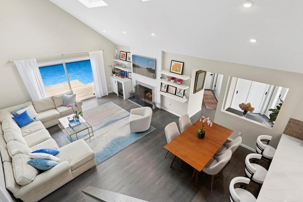 Dining room, Fireplace, Interior, Living room, Recessed Lighting, Wood Texture Flooring