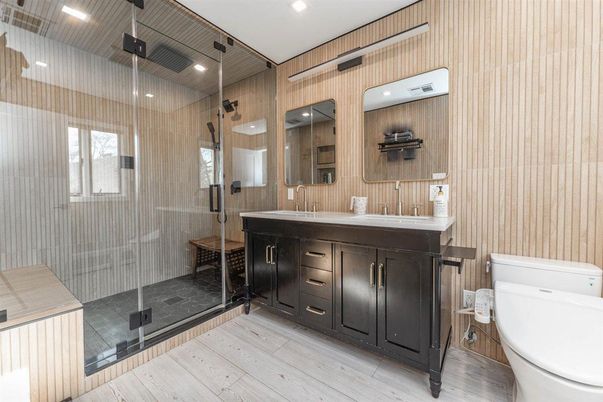 Bathroom, Glass Shower, Interior, Recessed Lighting, Wood Texture Flooring, Wooden Walls