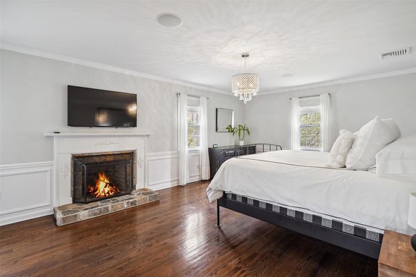 Bedroom, Chandelier, Fireplace, Interior, Wood Texture Flooring