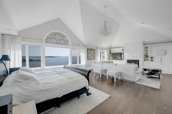 Bedroom, Fireplace, Interior, Living room, Pendant Lights, Water, Wood Texture Flooring