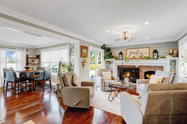 Dining room, Fireplace, Interior, Living room, Pendant Lights, Recessed Lighting, Wood Texture Flooring