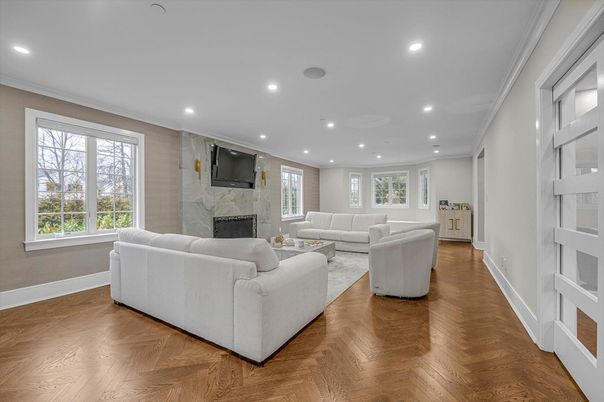 Fireplace, Interior, Living room, Marble Walls, Recessed Lighting, Wood Texture Flooring