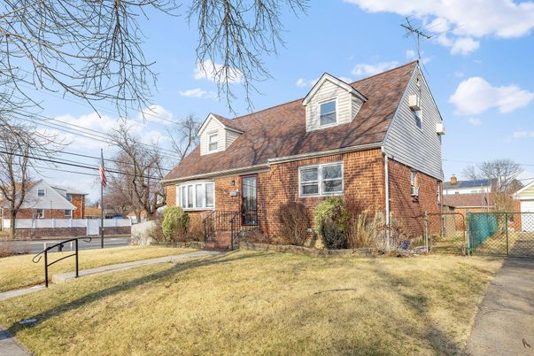Exterior, Facade, Brick Facade, Cape Cod