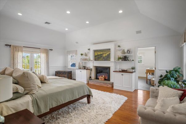 Bedroom, Fireplace, Interior, Recessed Lighting, Wood Texture Flooring