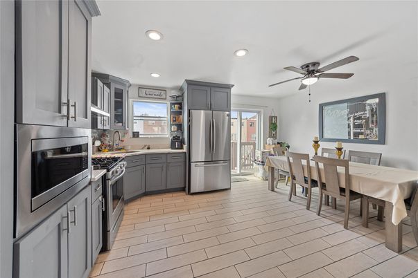 Dining room, Interior, Kitchen, Recessed Lighting, Stainless Steel Appliances, Wood Texture Flooring