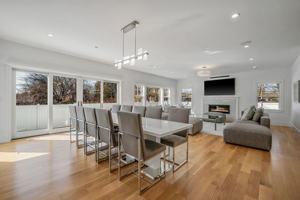 Dining room, Fireplace, Interior, Living room, Pendant Lights, Recessed Lighting, Wood Texture Flooring