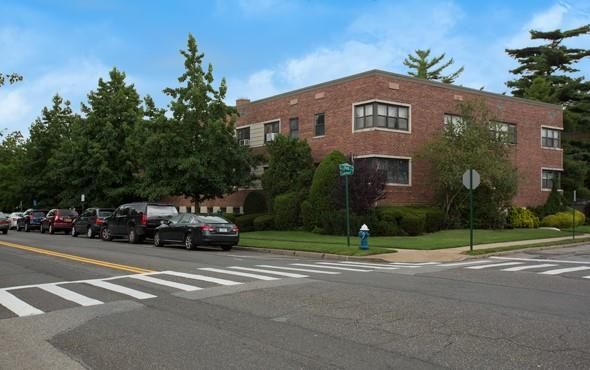 Exterior, Facade, Brick Facade, Condo Building