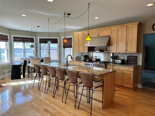 Dining room, Interior, Kitchen, Pendant Lights, Recessed Lighting, Stainless Steel Appliances, Wood Texture Flooring