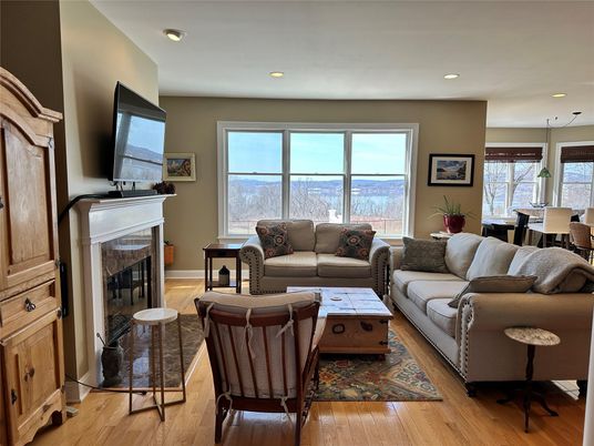 Dining room, Fireplace, Interior, Living room, Recessed Lighting, Wood Texture Flooring