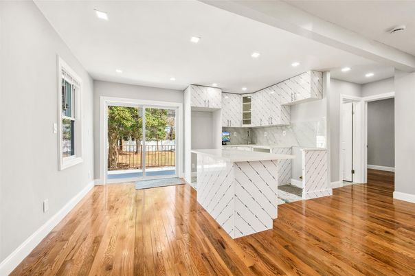 Interior, Kitchen, Marble Walls, Recessed Lighting, Wood Texture Flooring