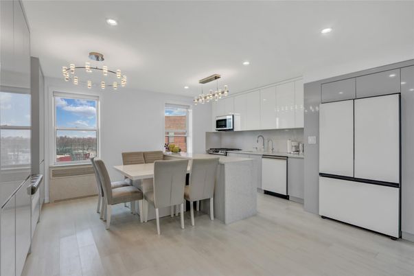 Dining room, Interior, Kitchen, Pendant Lights, Recessed Lighting, Stainless Steel Appliances, Wood Texture Flooring