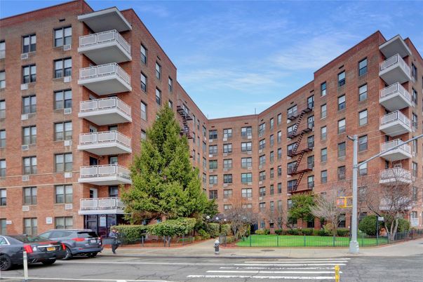 Exterior, Facade, Brick Facade, Condo Building