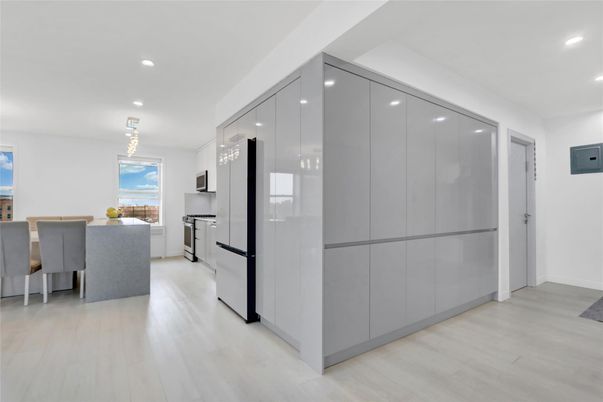 Dining room, Interior, Kitchen, Pendant Lights, Recessed Lighting, Stainless Steel Appliances, Wood Texture Flooring