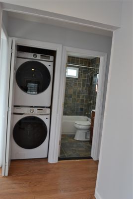 Bathroom, Interior, Utility Closets, Washer, Wood Texture Flooring